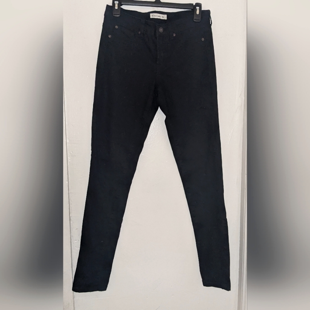 Mid rise dark black skinny jeans